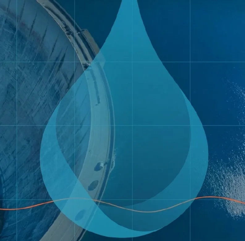 Surimpression goutte d'eau géante sur vue aérienne d'un barrage
